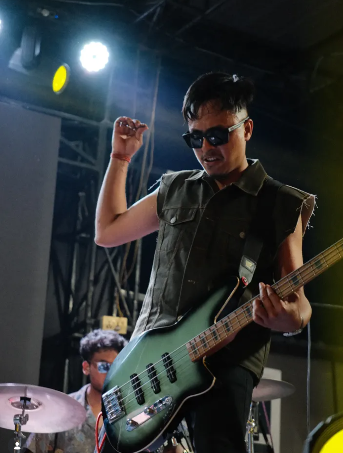 On stage playing bass